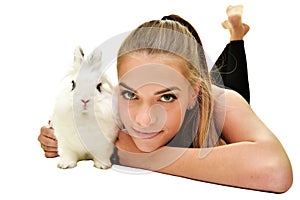 Beautiful young woman with her bunny