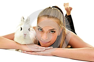 Beautiful young woman with her bunny