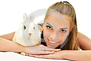 Beautiful young woman with her bunny