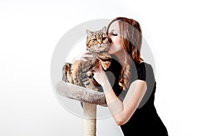 Beautiful young woman with her cat