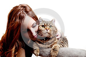 Beautiful young woman with her cat