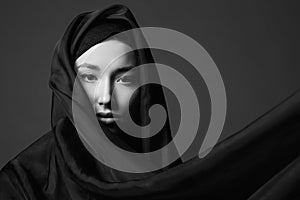 beautiful young woman in Hijab. Black and white portrait