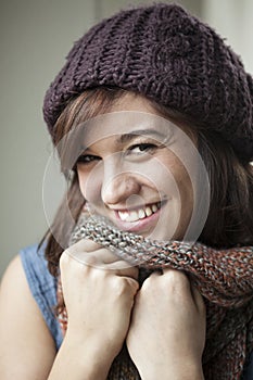 Beautiful Young Woman in Knit Scarf and Hat