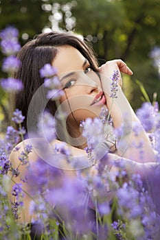 Beautiful young woman in lavander field