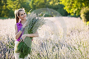 Beautiful young woman on lavander field - lavanda girl