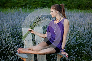 Beautiful young woman on lavander field - lavanda girl