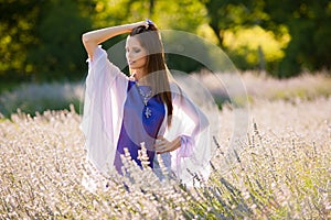 Beautiful young woman on lavander field - lavanda girl