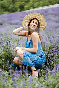 Beautiful young woman in a lavender field