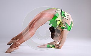 Beautiful young woman limber exerciser photo