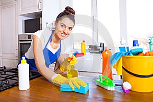 Beautiful young woman makes cleaning the house. Girl cleaning kitchen. Set.