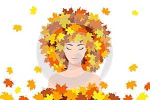 Beautiful young woman with maple leaves on her head