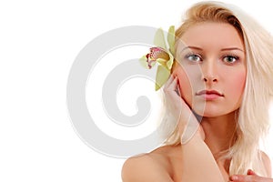 Beautiful young woman with orchid