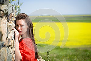 Beautiful young woman outdoors enjoying nature