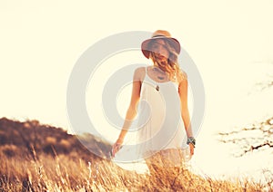 Beautiful Young Woman Outdoors. Soft warm vintage color