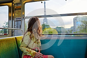 Beautiful young woman in Parisian metro