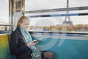 Beautiful young woman in Parisian subway