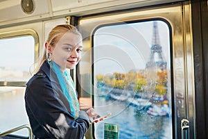 Beautiful young woman in Parisian subway
