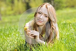 Beautiful young woman in park