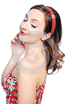 Beautiful young woman with pin-up make-up