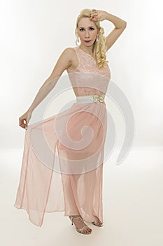 Beautiful young woman with pink dress