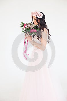 Beautiful Young Woman in Pink Dress. Fashion Model