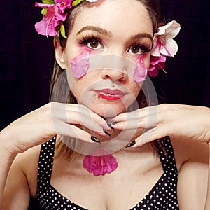 Beautiful Young Woman With Pink Flowers