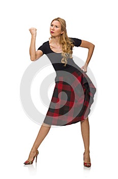 Beautiful young woman in plaid dress isolated on