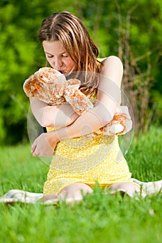 Beautiful young woman play with toy