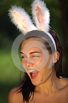 Beautiful young woman with playboy rabbit ears