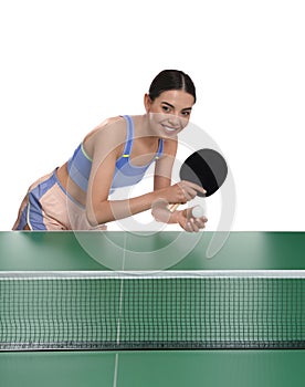 Beautiful young woman playing ping pong on white background