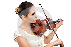 Beautiful young woman playing violin over white