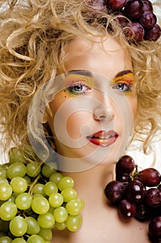 Beautiful young woman portrait excited smile with fantasy art hair makeup style, fashion girl with creative food fruit