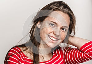Beautiful young woman portrait freckles smiling posing attractive brunette