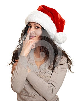 Beautiful young woman portrait in santa helper hat posing on white