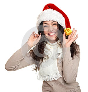 Beautiful young woman portrait in santa helper hat posing on white