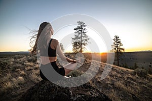 Beautiful young woman practice yoga at sunset time on nature outdoors. Healthy lifestyle concept