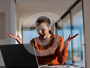 Beautiful young woman relax and work on laptop