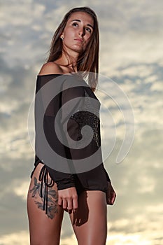 Beautiful young woman relaxing on the beach