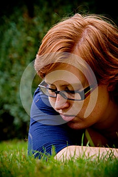 Beautiful young woman relaxing outside