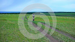 Beautiful Young Woman Riding Bike Bicycle Through Rural Path Sunflower Field Farm Life Ecology Farming Rural Environment