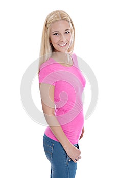 Beautiful young woman in rose shirt and blue jeans isolated.