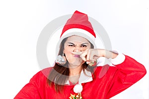 Beautiful young woman Santa Claus hat allerygy at her nose