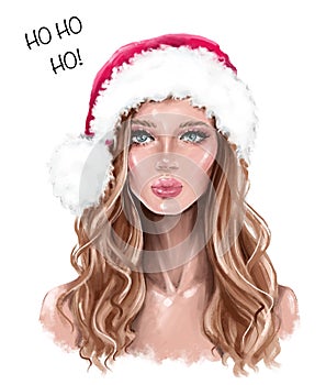 Beautiful young woman in Santa hat. Fashion girl in red cap with fur. Pretty woman face.