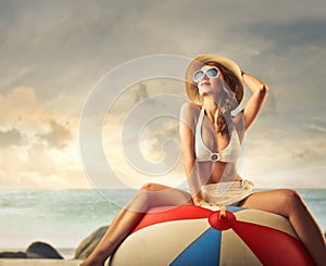 Beautiful young woman at the seaside