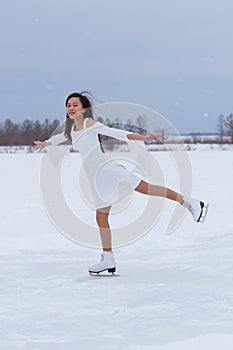 Beautiful young woman on skates
