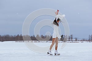 Beautiful young woman on skates