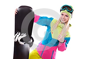 beautiful young woman in ski outfit and ski glasses hold snowboa