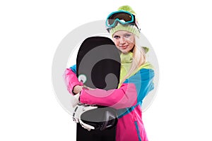 beautiful young woman in ski outfit and ski glasses hold snowboa
