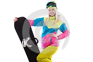 beautiful young woman in ski outfit and ski glasses hold snowboa