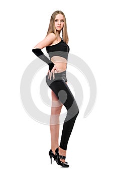 Beautiful young woman in skintight black costume photo